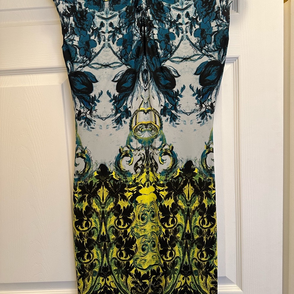 Roberto Cavalli cap sleeves. Size 44.length 41”. Lined. Blue/grey/ yellow.